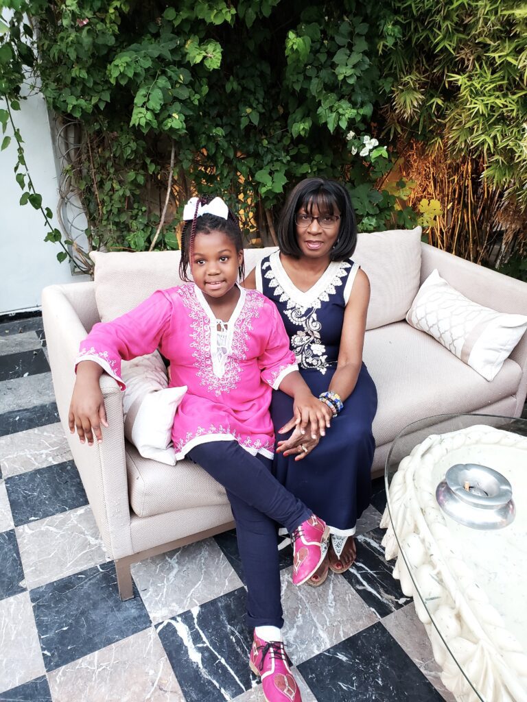 Posing in traditional dress at a restaurant in Morocco